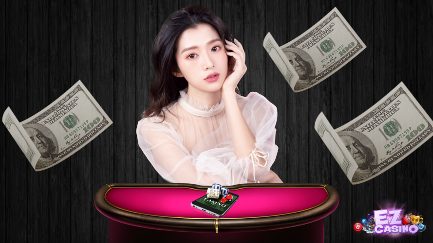 ผู้หญิงน่ารักกับโต๊ะพนันที่กำลังเปิดผู้ให้บริการ รวมเกมคาสิโน ezcasino ผ่านหน้าจอโทรศัพท์